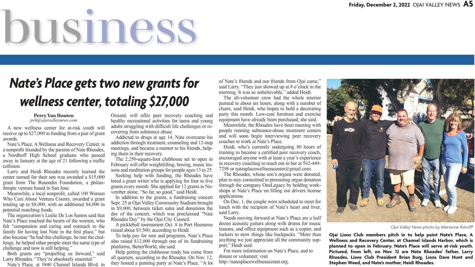 Newspaper photo of Lions Club members Brian Burg, dave Hunt, Stephen Weed with Larry Rhoades and Heidi Allison