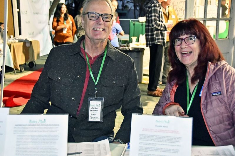 Matt Kernoodle And Board Treasurer, Diana DeJoseph, Checking In Guests